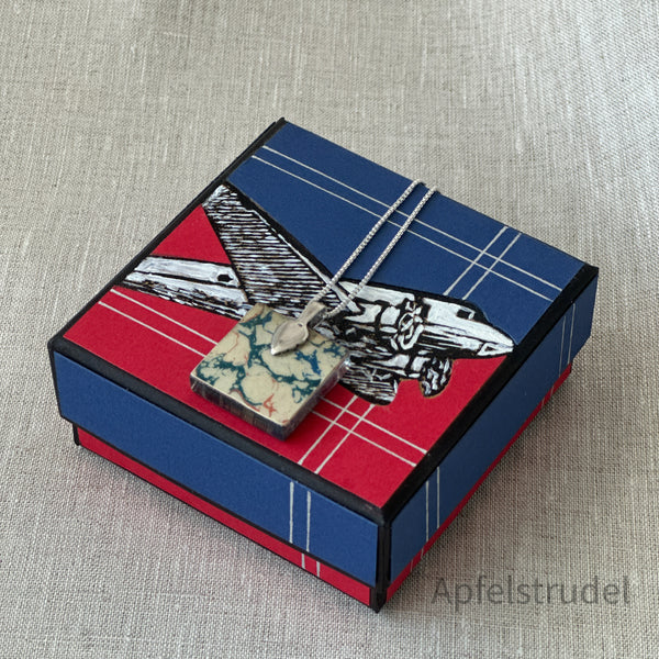 Square glass pendant featuring a genuine 1959 Netherlands postage stamp (Scott #371) celebrating the 40th anniversary of KLM Royal Dutch Airlines, set in a sterling silver frame