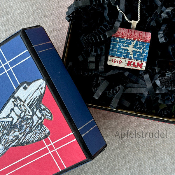 Square glass pendant featuring a genuine 1959 Netherlands postage stamp (Scott #371) celebrating the 40th anniversary of KLM Royal Dutch Airlines, set in a sterling silver frame